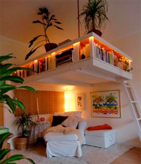 decoração de quarto, plantas, poltronas almofadas livros 
