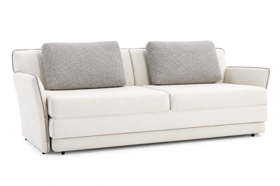 Sofá Cama Betzra em linho branco, com duas almofadas soltas em Chevron Cinza e Off White e acabamento em vivo nas bordas.