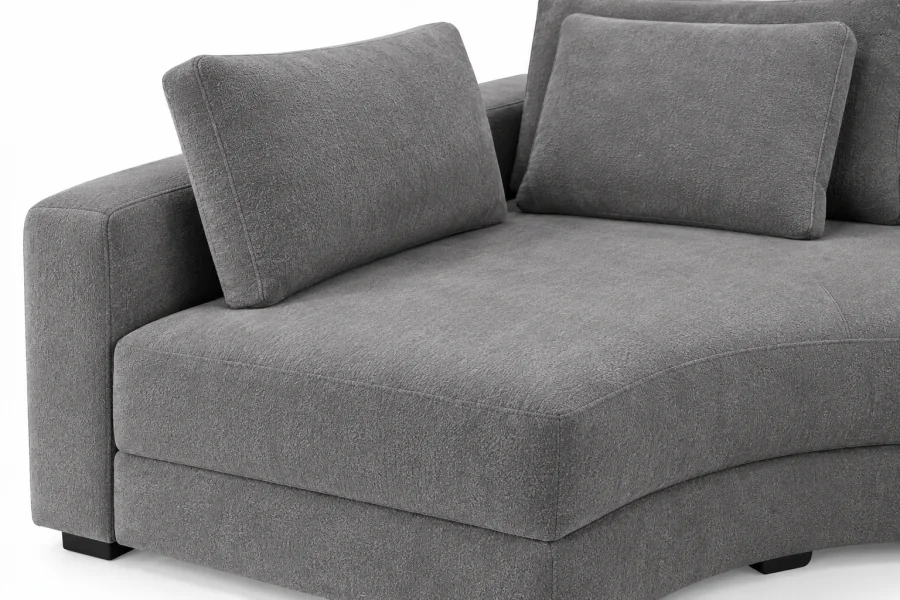 Detalhe do Sofá Modular com Chaise Módena em tecido Cinza, destacando textura, assento e almofadas soltas