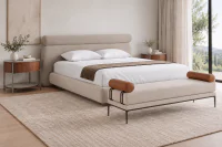 Duas Mesas de Cabeceira Oval Olivar em Nogueira e recouro Cinza com base Grafite, ao lado de cama estofada bege em quarto contemporâneo.
